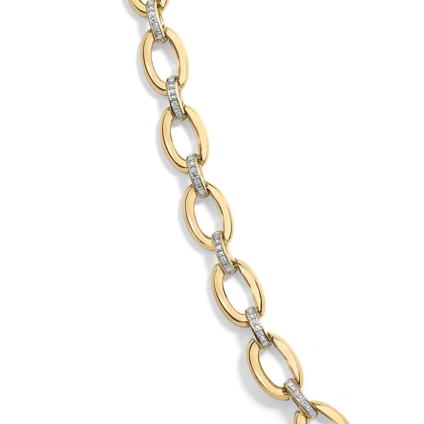 Close-up angled view of a yellow metal necklace featuring oval links connected by smaller links paved with white round gemstones.