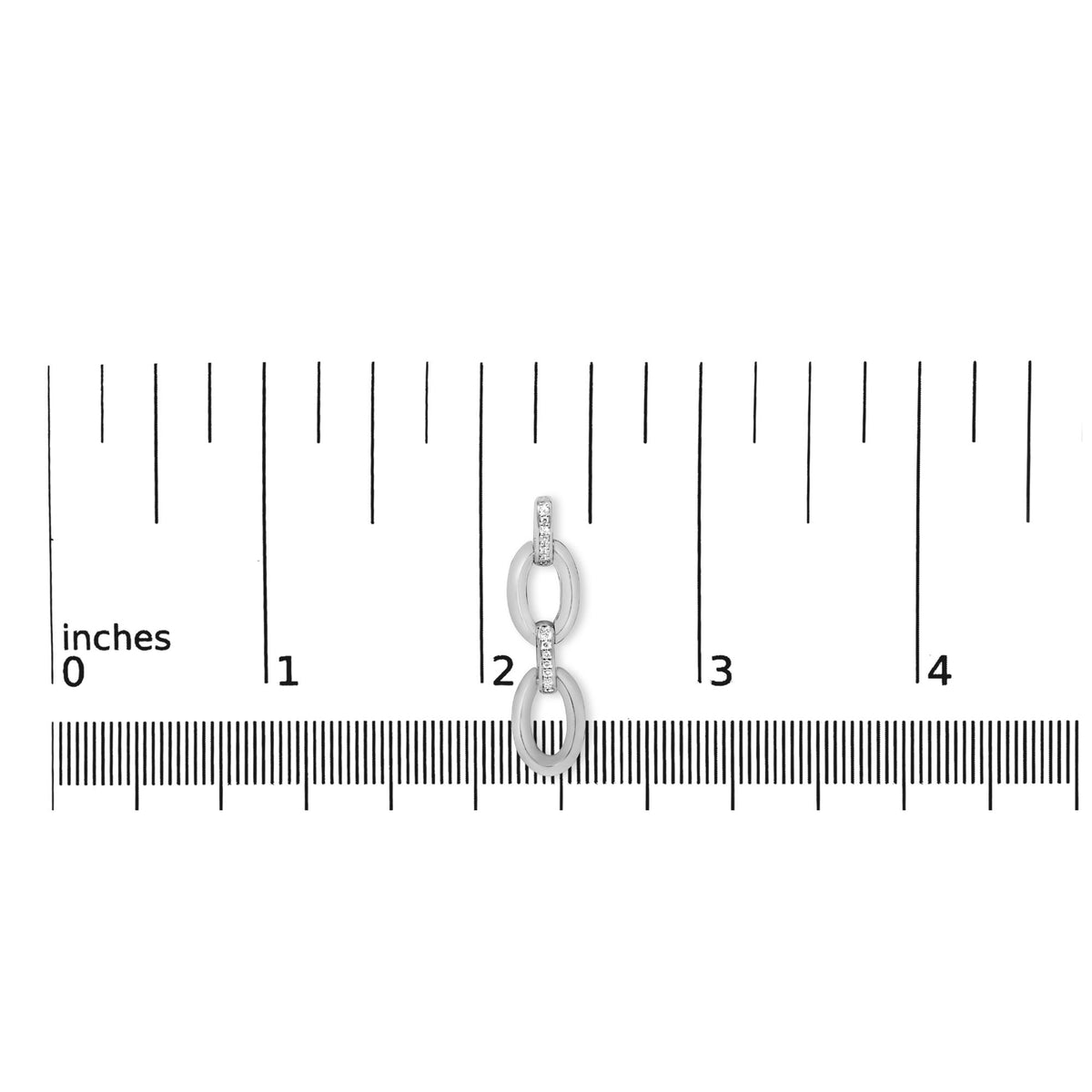 Close-up front view of white metal earrings with linked oval shapes, featuring round white gemstones in pave setting, shown on a ruler scale.