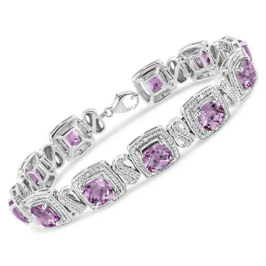 White metal bracelet with alternating cushion-shaped purple gemstones in prong settings and intertwined links, accented with round white gemstones in pave settings, shown at an angled top-down view.