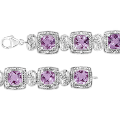 Close-up shot of a white metal bracelet featuring cushion-shaped purple gemstones in prong settings, accented by square frames with round white gemstones in pave settings.