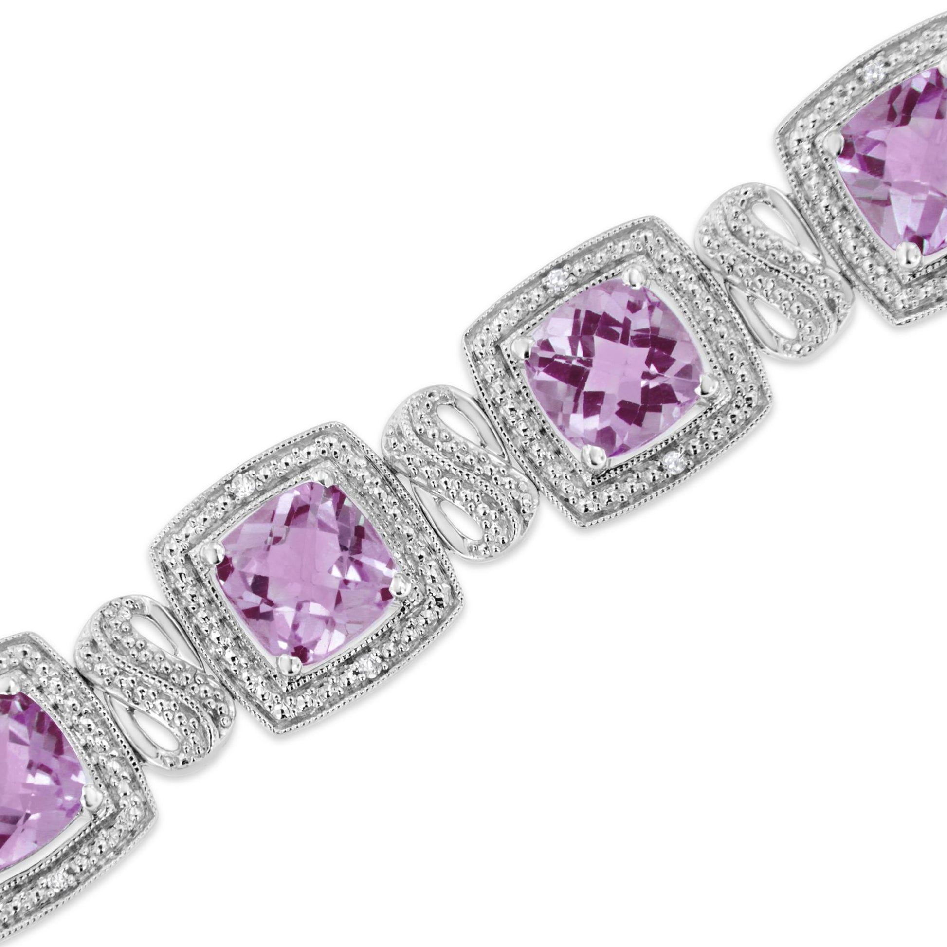 Close-up, diagonal view of a white metal bracelet featuring cushion-shaped purple gemstones in prong settings, each surrounded by square frames with round white gemstones in pave settings.
