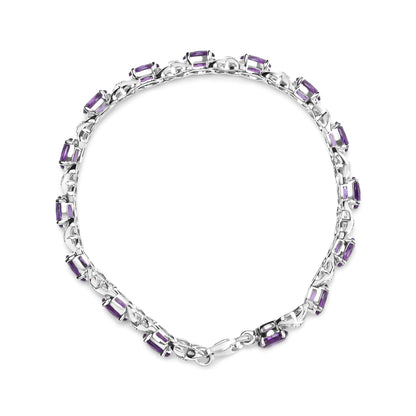 Top-down view of a white metal bracelet featuring rectangular purple gemstones and round white gemstones in prong settings along the band.