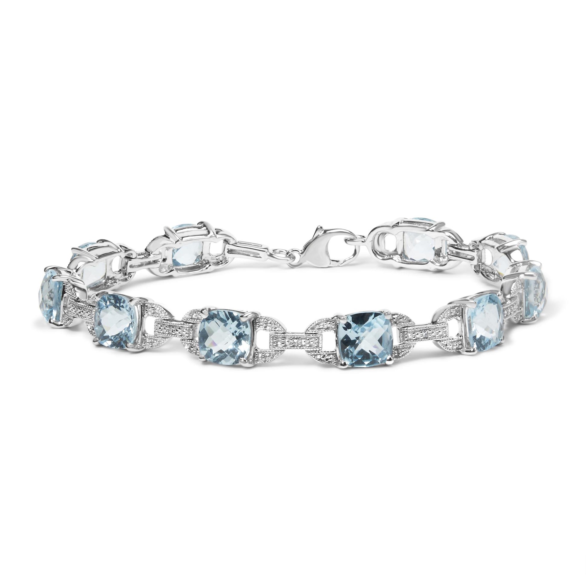 White metal bracelet with alternating round white gemstones and cushion-shaped blue gemstones in prong settings, shown in a front angled view.
