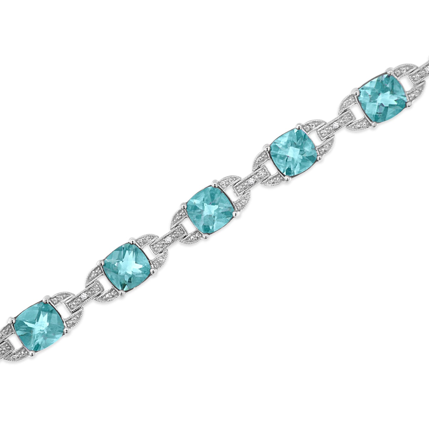 White metal bracelet with cushion-shaped blue gemstones and round white gemstones in prong settings, shown in a diagonal close-up view.