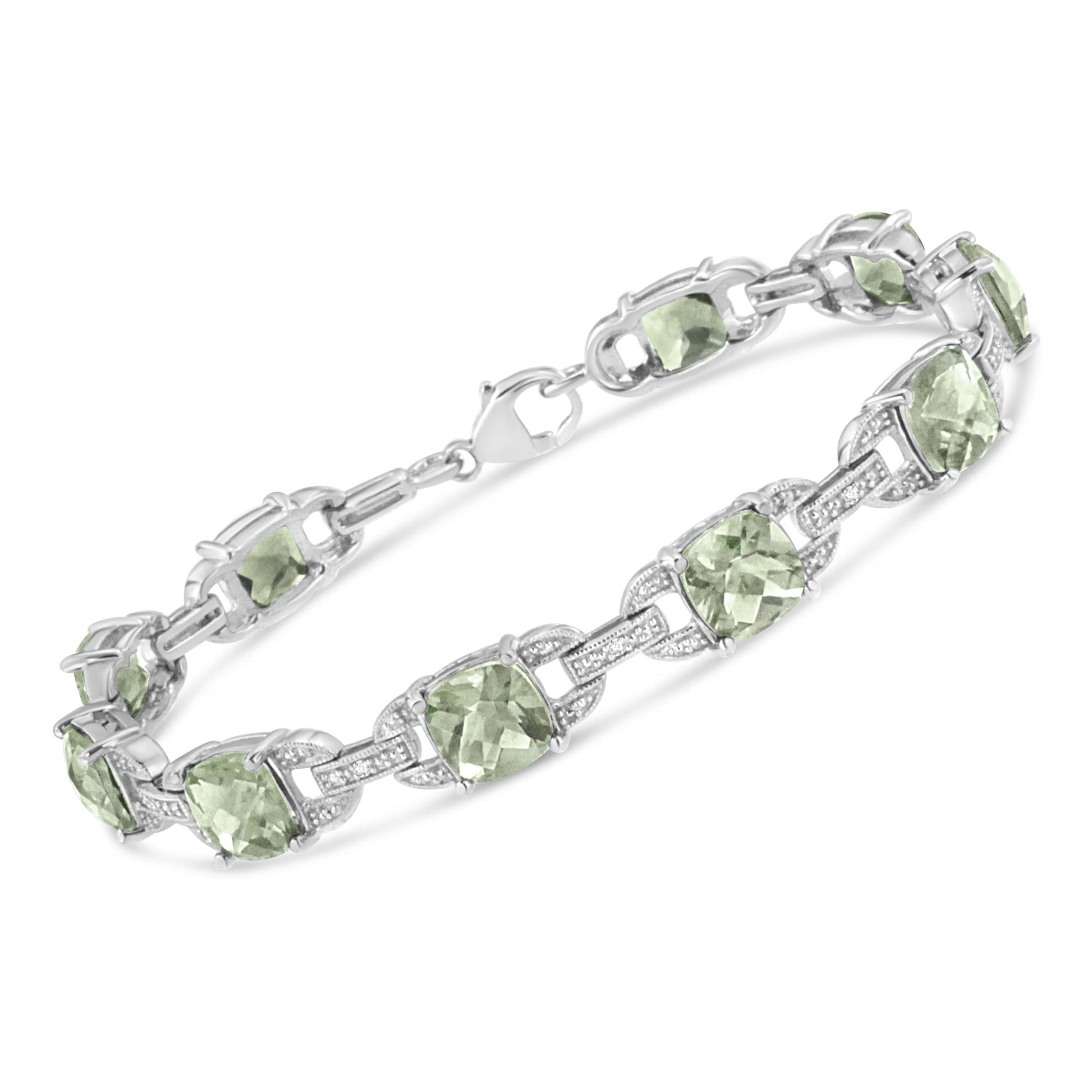 White metal bracelet with alternating green cushioned-shaped gemstones and linked sections adorned with small white round gemstones, shown from a slightly angled top view.