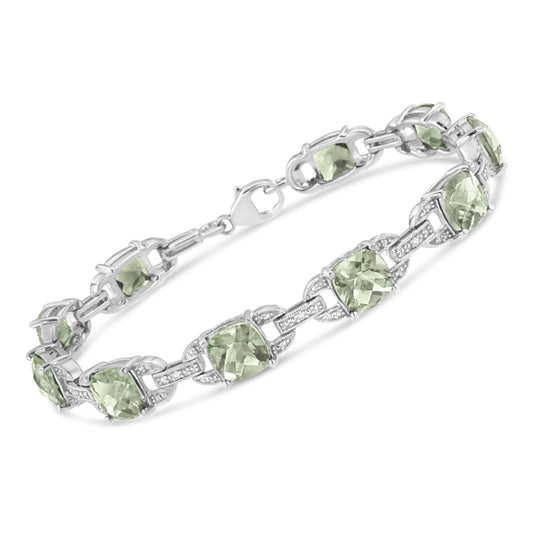 White metal bracelet with alternating green cushioned-shaped gemstones and linked sections adorned with small white round gemstones, shown from a slightly angled top view.