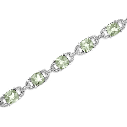 White metal bracelet with alternating green cushion-shaped gemstones and white round gemstones in prong settings, shown in a diagonal close-up view.