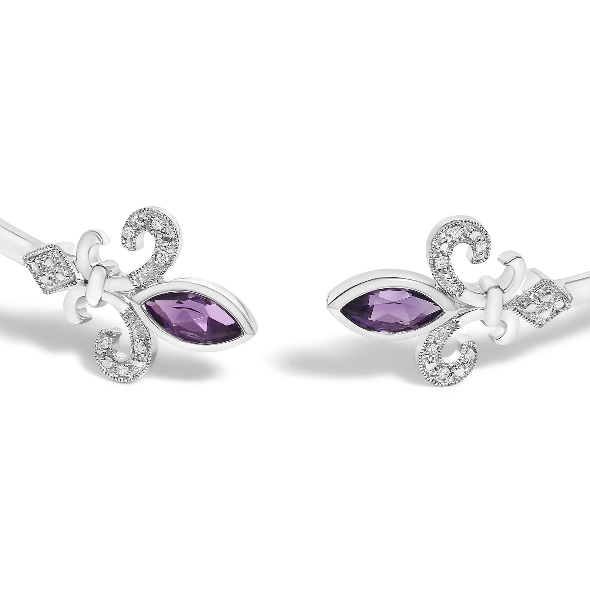 Close-up angle of a white bracelet featuring two marquise-shaped purple gemstones in bezel settings at the open ends, each accented by pave-set round white gemstones forming decorative scroll shapes.