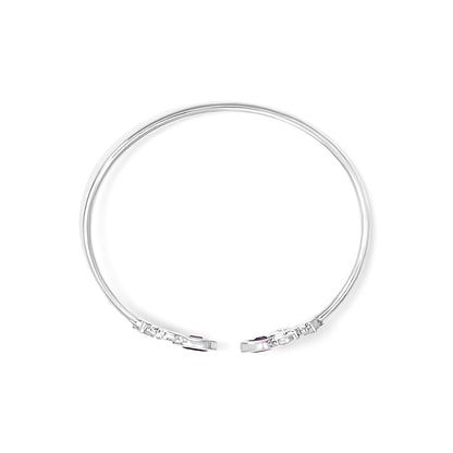 White metal open cuff bracelet shown from above, featuring round white gemstones in pave setting and two purple marquise-shaped gemstones in bezel setting near the ends.