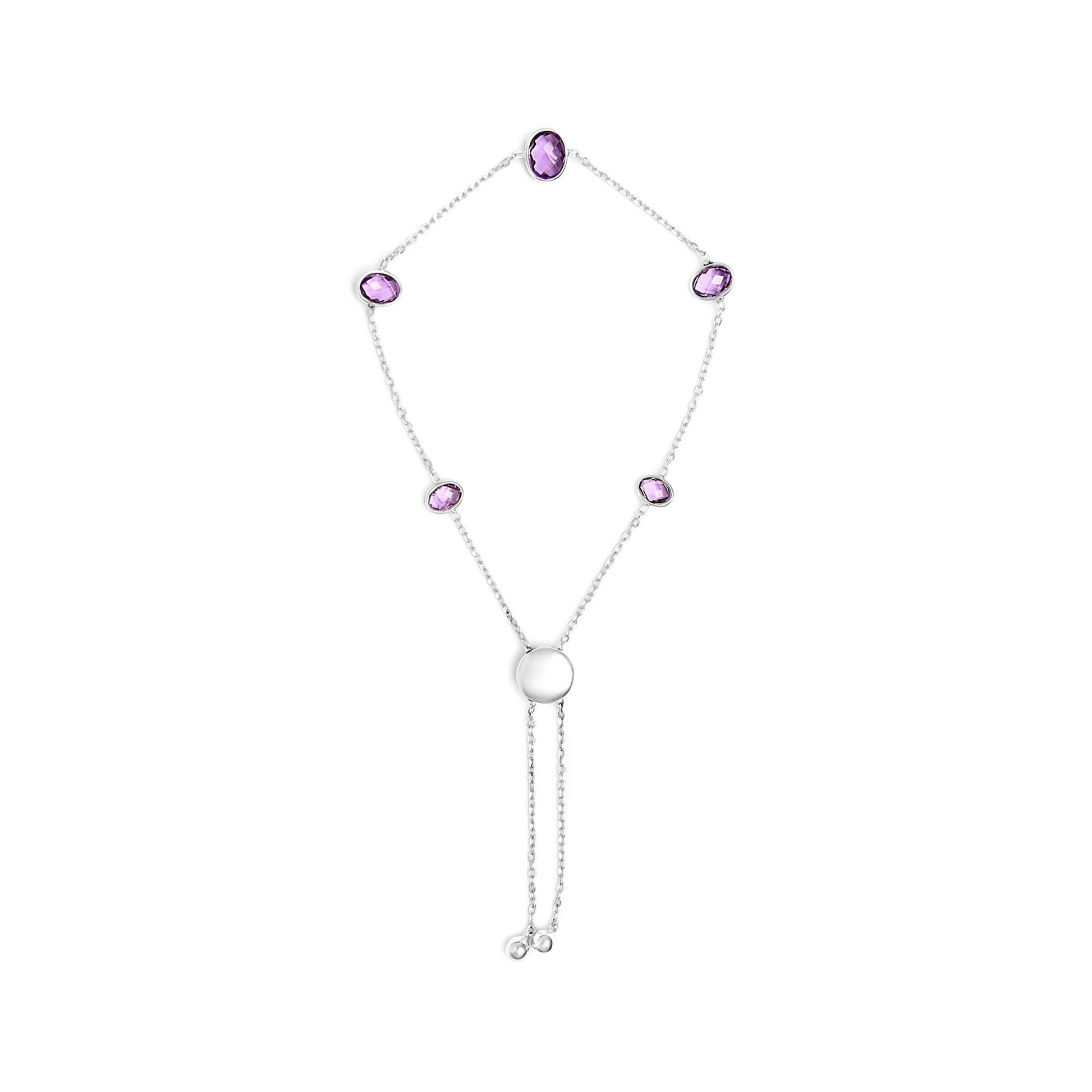 Top-down view of a white metal bracelet with several oval purple gemstones set in bezels connected by a delicate chain, featuring an adjustable sliding clasp with two small round metal ends.
