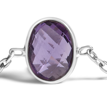 Close-up front angle of a white metal bracelet featuring an oval purple gemstone in a bezel setting.