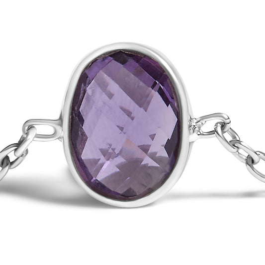 Close-up front angle of a white metal bracelet featuring an oval purple gemstone in a bezel setting.