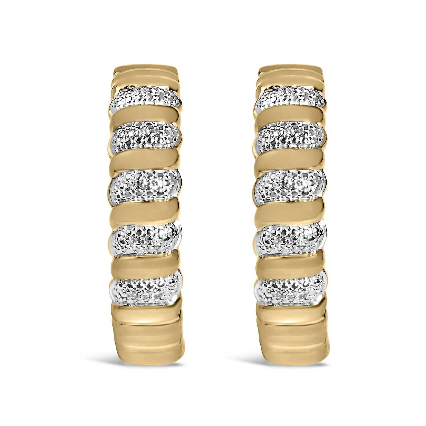 Close-up front view of a pair of yellow metal earrings featuring alternating smooth bands and sections paved with round white gemstones.