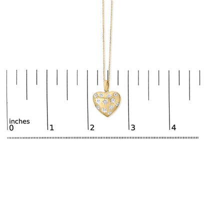 Close-up front of gold vermeil heart pendant necklace showcasing 1/10 cttw diamond star accents with inch ruler for scale