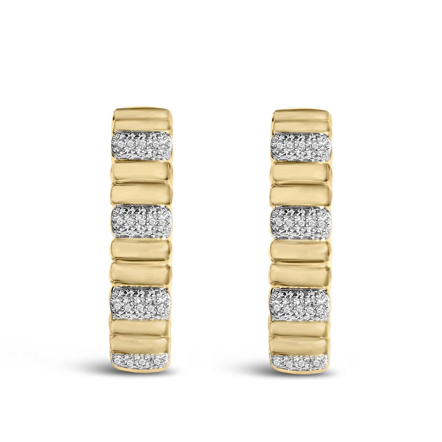 Front view of gold vermeil ribbed hoop earrings with 1/10 cttw diamonds alternating with smooth gold sections on white background