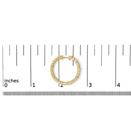 Front view of gold vermeil 1/10 cttw diamond ribbed hoop earring on inch and millimeter scale