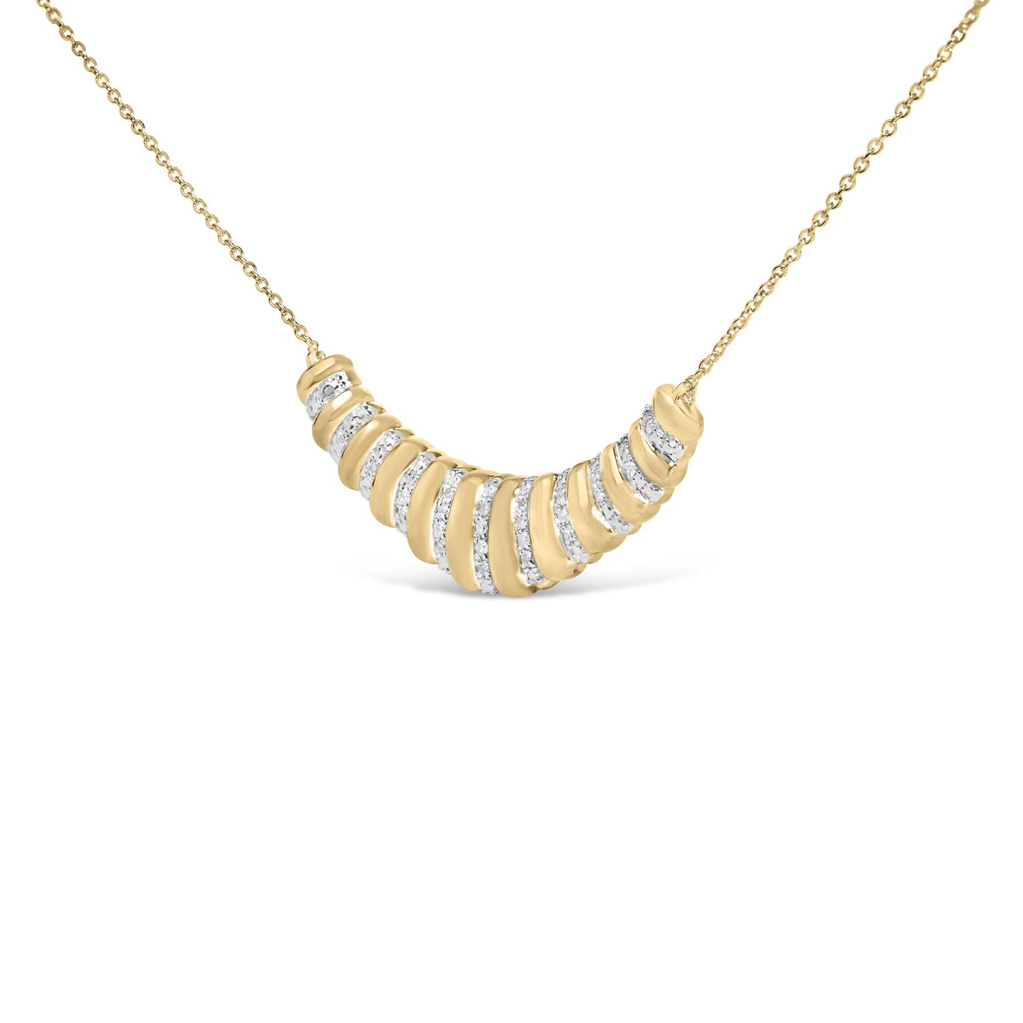 Front close-up of gold vermeil crescent pendant necklace showing ribbed bands and diamond pave on white background