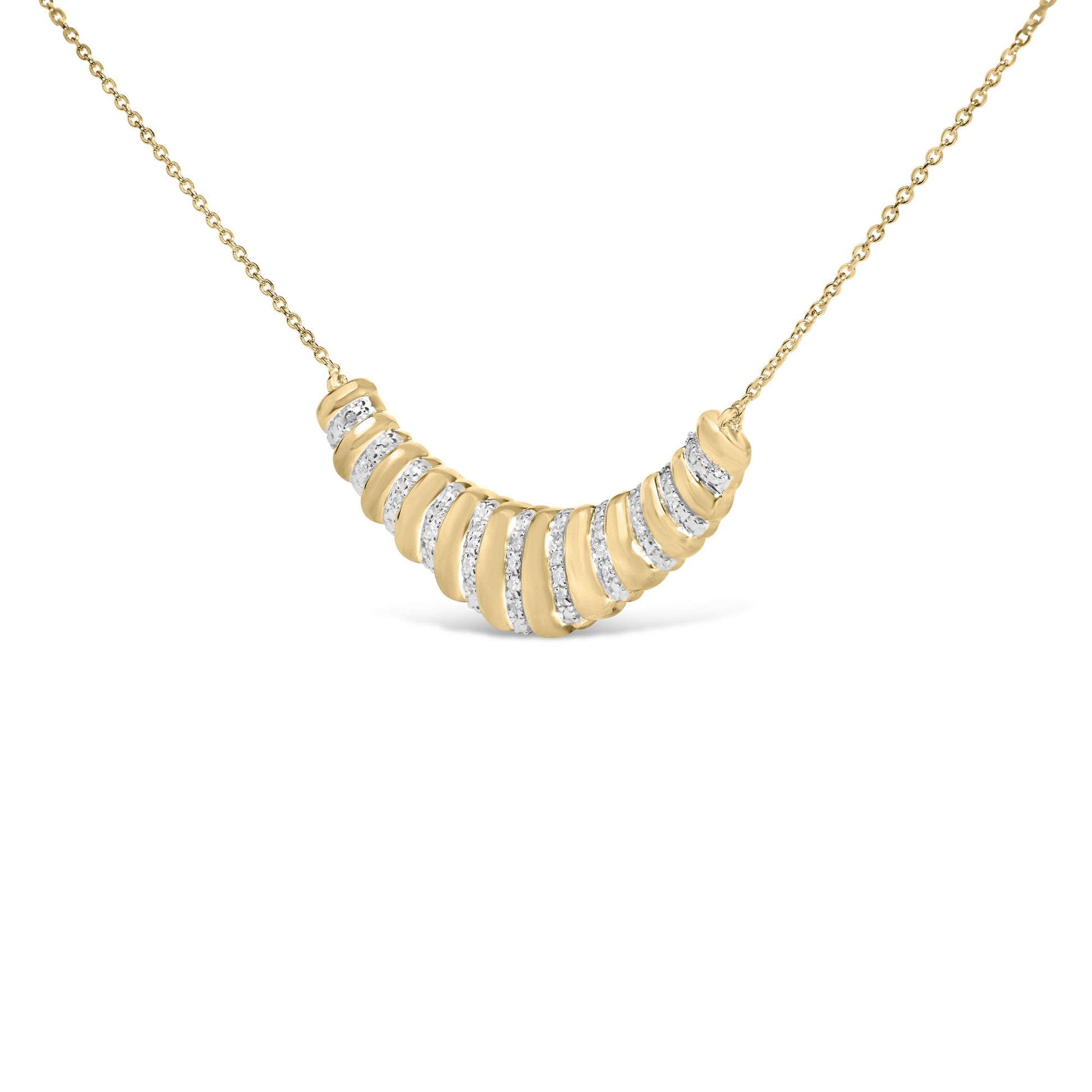 Front close-up of gold vermeil crescent pendant necklace showing ribbed bands and diamond pave on white background