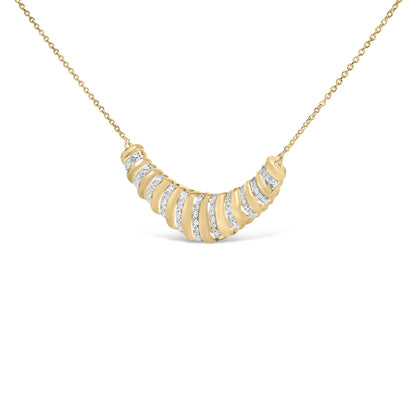 Front close-up of gold vermeil crescent pendant necklace showing ribbed bands and diamond pave on white background