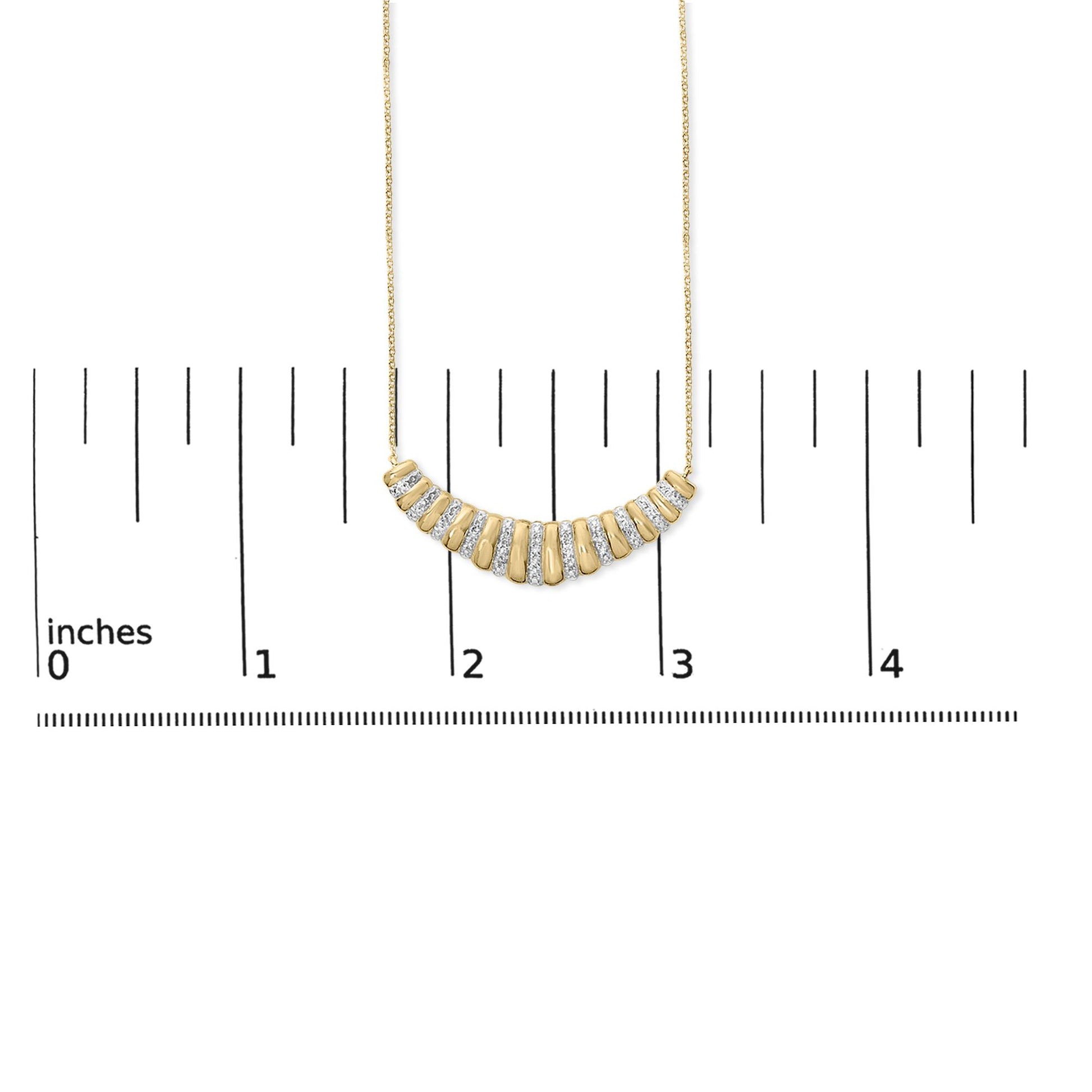 Front view of gold vermeil pendant necklace with curved ribbed bar and alternating diamond pave and polished segments on ruler scale