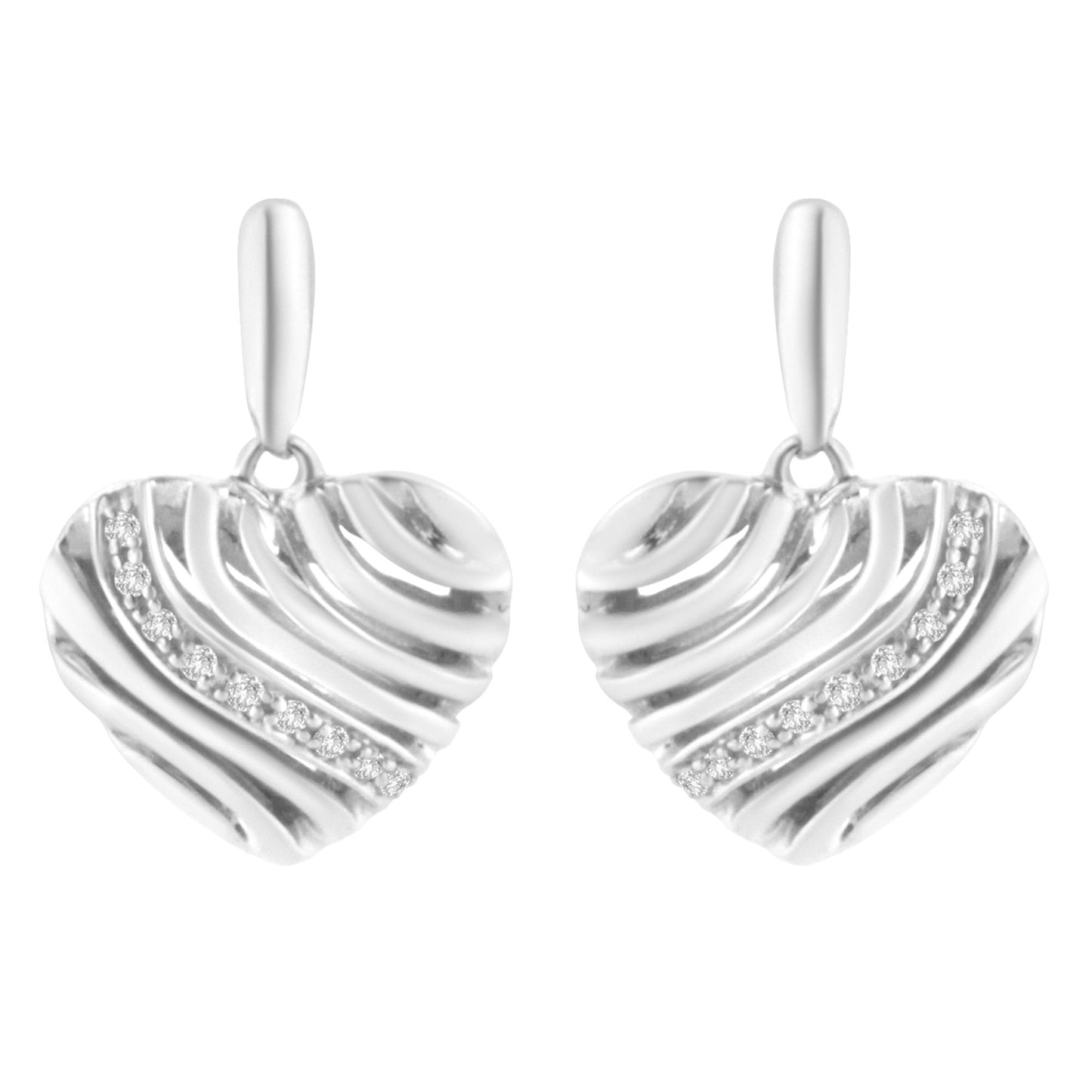 Front view of white metal heart-shaped earrings with diagonal ridges and a curved line of round white gemstones in a pave setting.