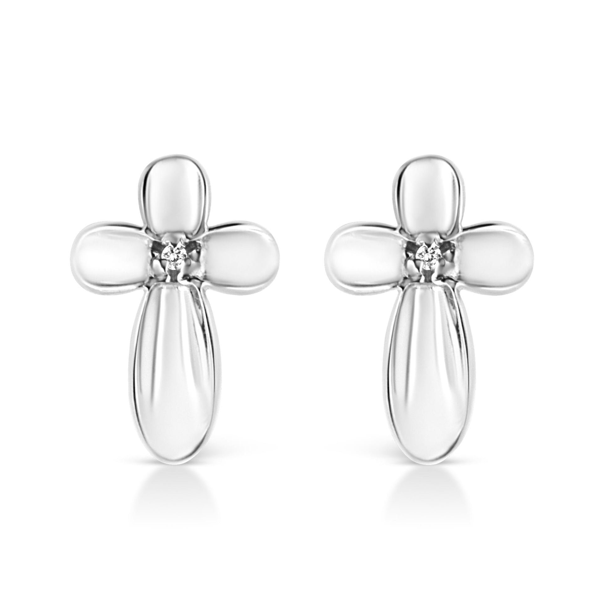 Front view of pair of white metal cross-shaped earrings each set with a round white gemstone in prong setting at the center.