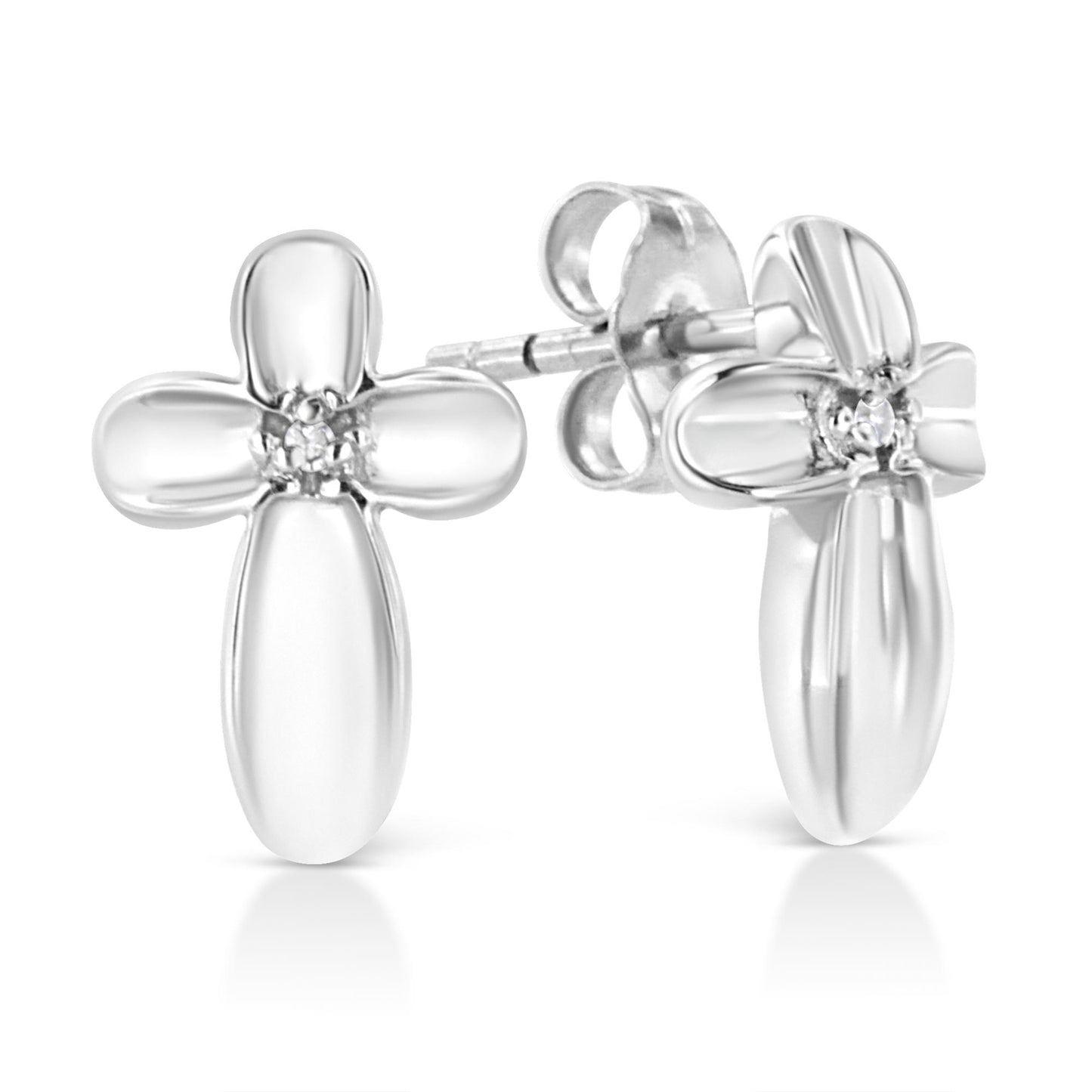 Front and side angled view of white metal cross-shaped stud earrings with a round white gemstone in the center of each.