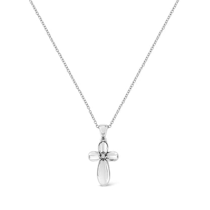 White metal necklace with a cross-shaped pendant featuring a single round white gemstone in prong setting, shown in a front-facing view.