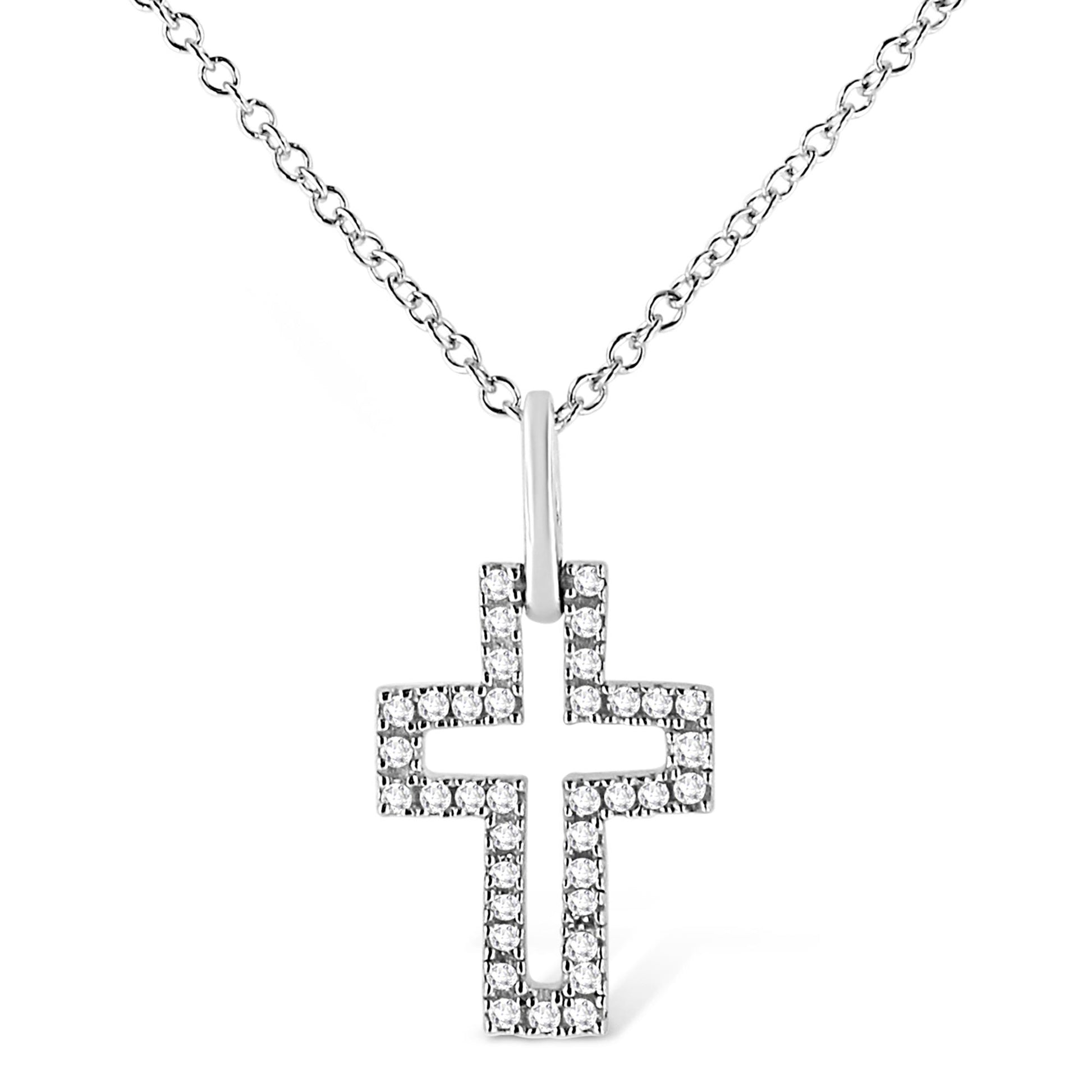 Front view of a white metal necklace with a cross-shaped pendant featuring round white gemstones in a pave setting.