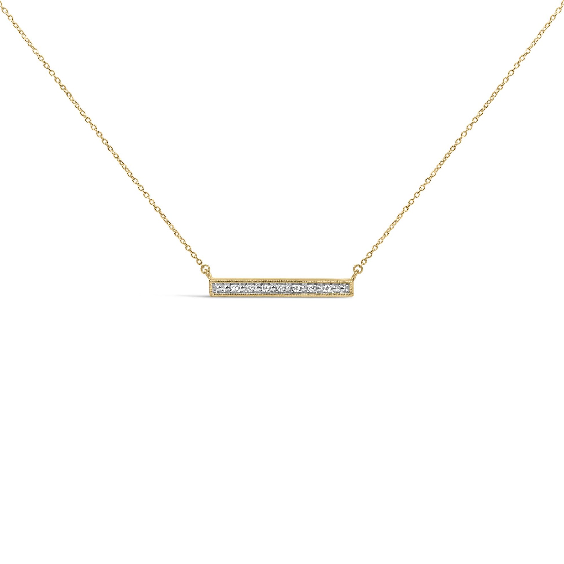 Close-up front view of a yellow metal necklace with a horizontal rectangular bar pendant featuring a row of round white gemstones in prong settings.