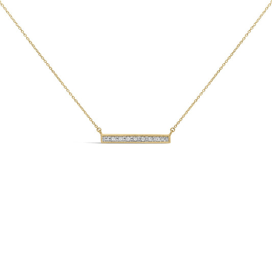 Close-up front view of a yellow metal necklace with a horizontal rectangular bar pendant featuring a row of round white gemstones in prong settings.