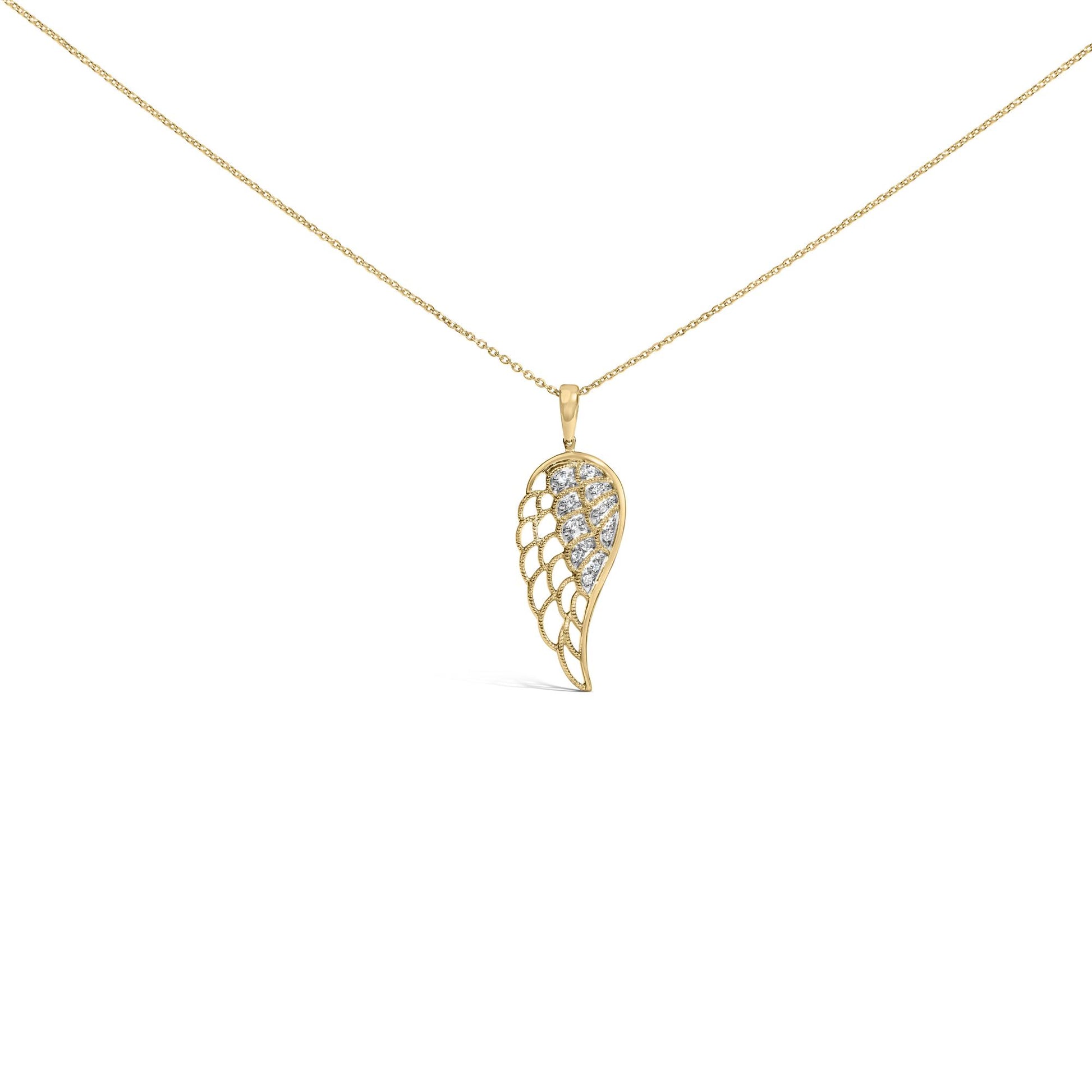 Close-up front angle of a yellow necklace with a wing-shaped pendant featuring pave-set white round gemstones.