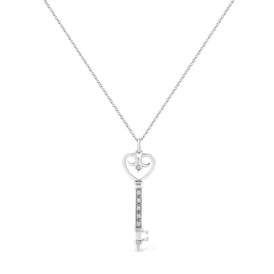 Front view of a white necklace with a heart-shaped key pendant featuring round brownish gemstones in pave and bezel settings.