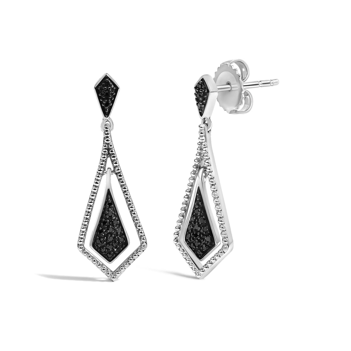 Close-up front and side angle of white metal dangle earrings with black gemstones in a pave setting forming geometric shapes.