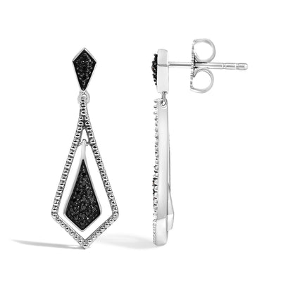 Close-up front and side views of white metal drop earrings with geometric shapes featuring pave-set black round gemstones, shown on a white background.