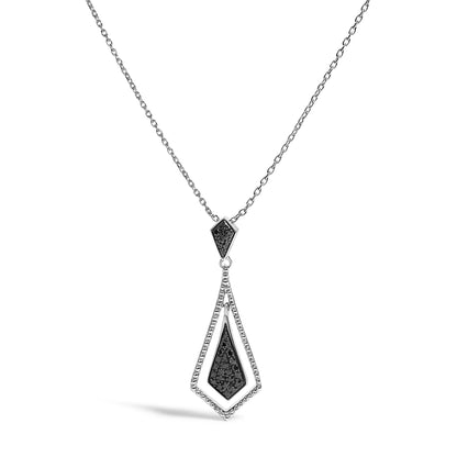 Close-up front angle of a white metal necklace with two geometric pendant pieces featuring small black gemstones in pave setting, shown on a white background.