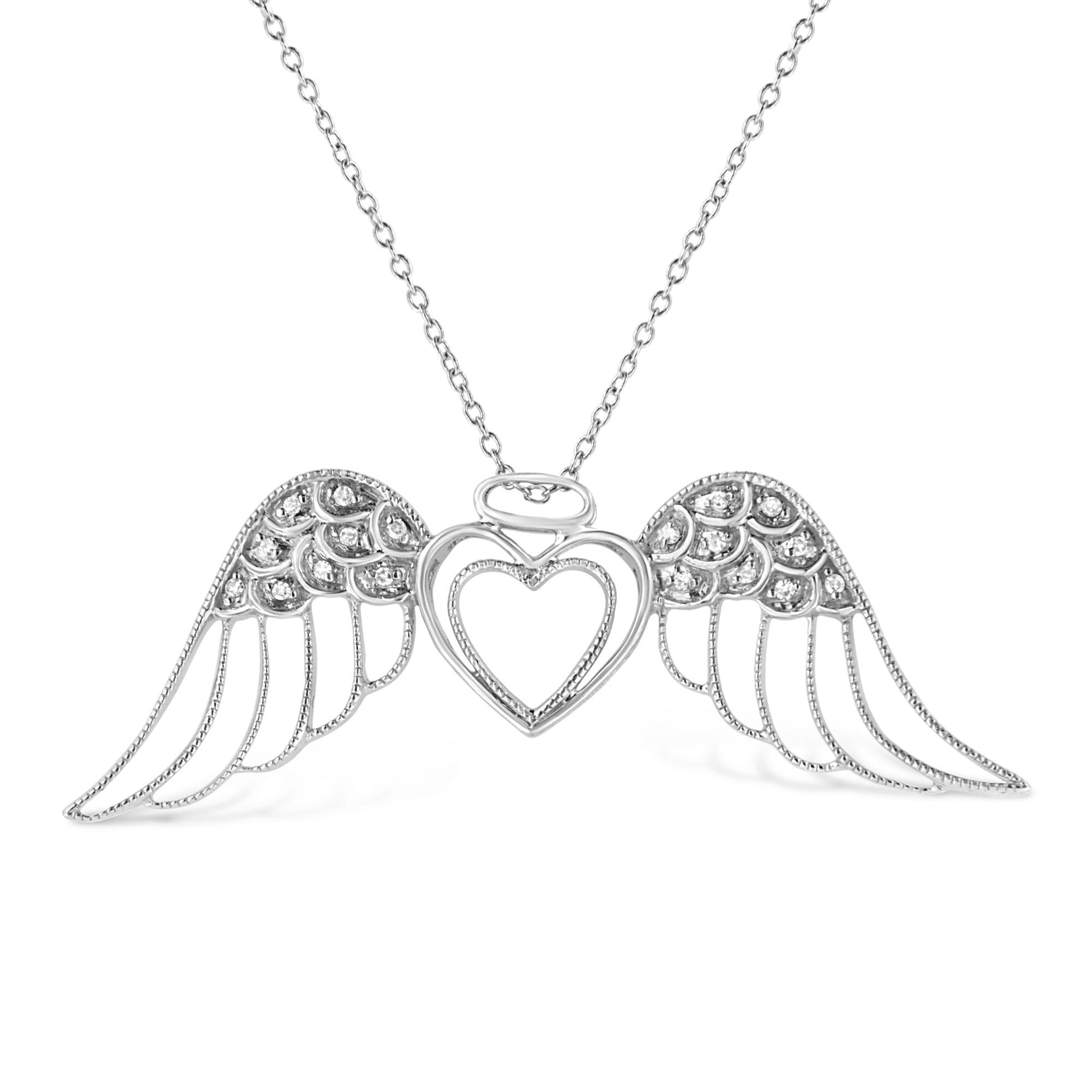Front-facing shot of a white metal necklace with a heart-shaped pendant flanked by angel wings, each wing adorned with round white gemstones in pave setting.