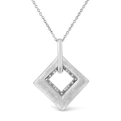 Front view of white metal square pendant necklace with a smaller square center outlined with white round pave-set gemstones, hanging on a chain.