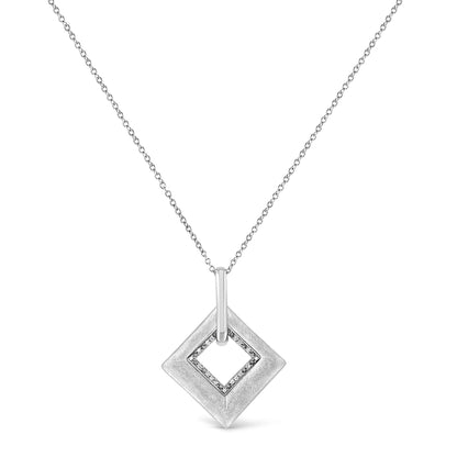 Front view of a white metal necklace with a square-shaped pendant featuring an open center and a smaller square inset adorned with pave-set round white gemstones.