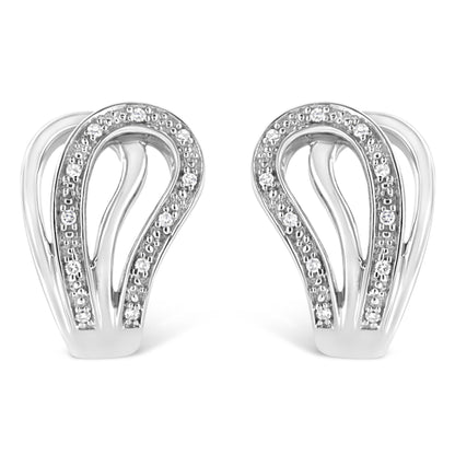 Front view of a pair of white metal earrings with a flowing design accented by round white gemstones in a pave setting.