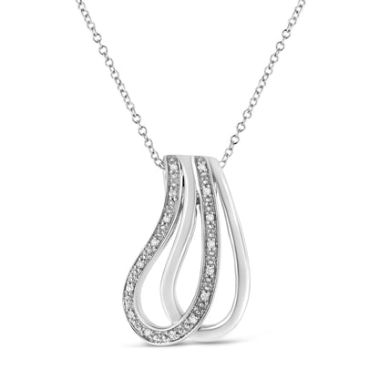 Front angled view of a white metal necklace with a pendant featuring two intertwined, curved loops, one loop adorned with round white gemstones in a pave setting.