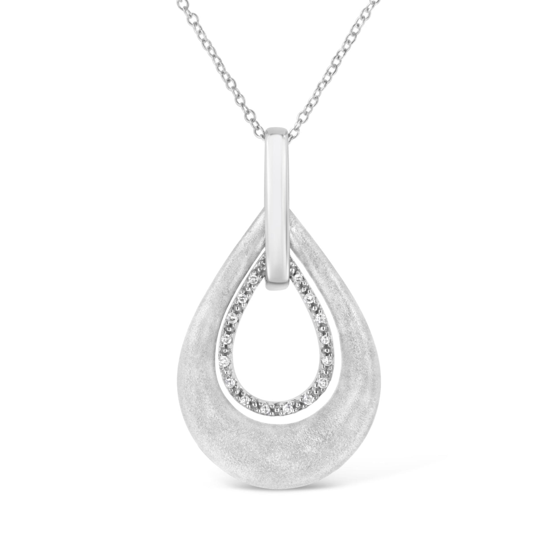 Front view of a white metal teardrop-shaped necklace pendant with an inner teardrop outline set with round white gemstones, attached to a chain.