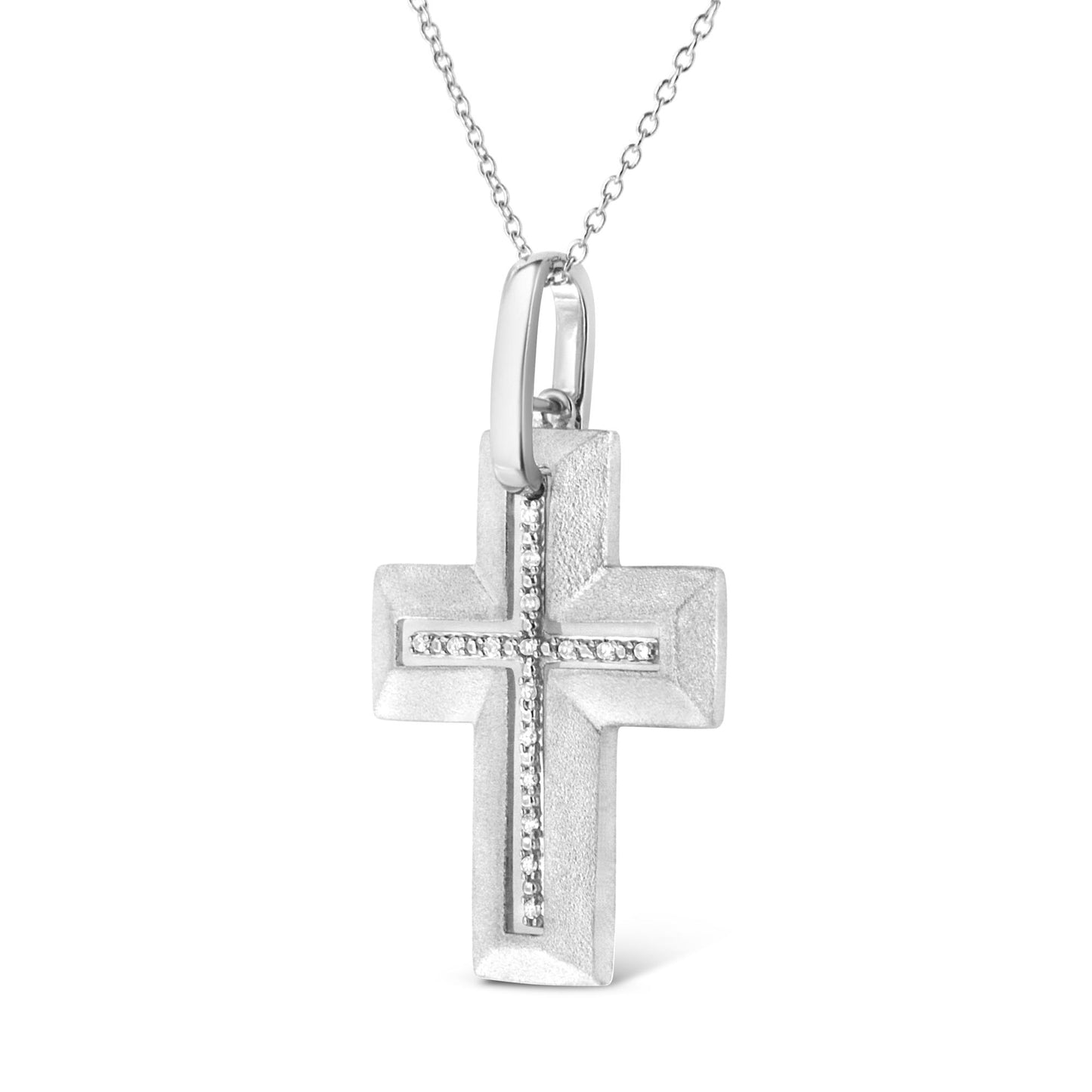 Front view of white metal cross necklace pendant adorned with small round white gemstones in a prong setting along the center, hanging on a white chain.