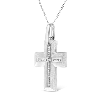 Front view of white metal cross necklace pendant adorned with small round white gemstones in a prong setting along the center, hanging on a white chain.