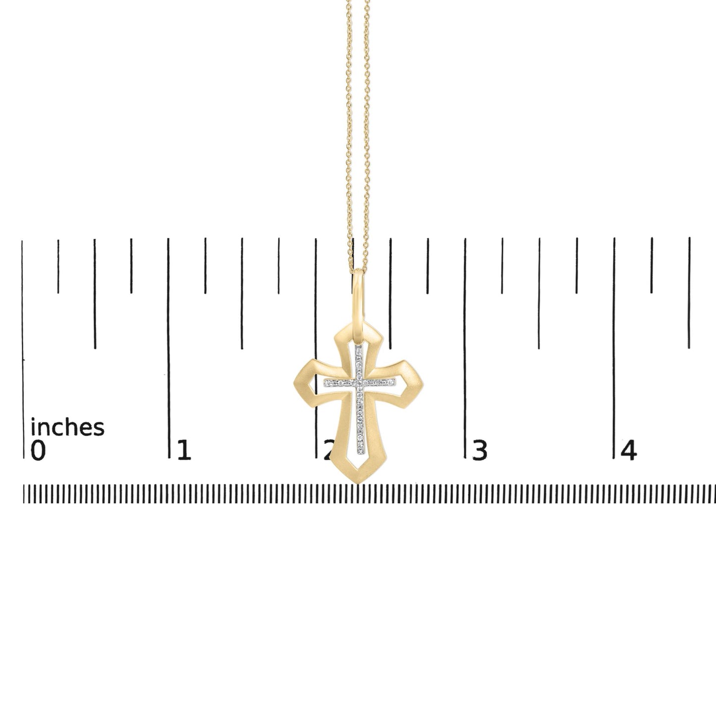 Front view of gold vermeil Roman cross pendant showcasing diamond-accent center and chain on an inch measurement ruler