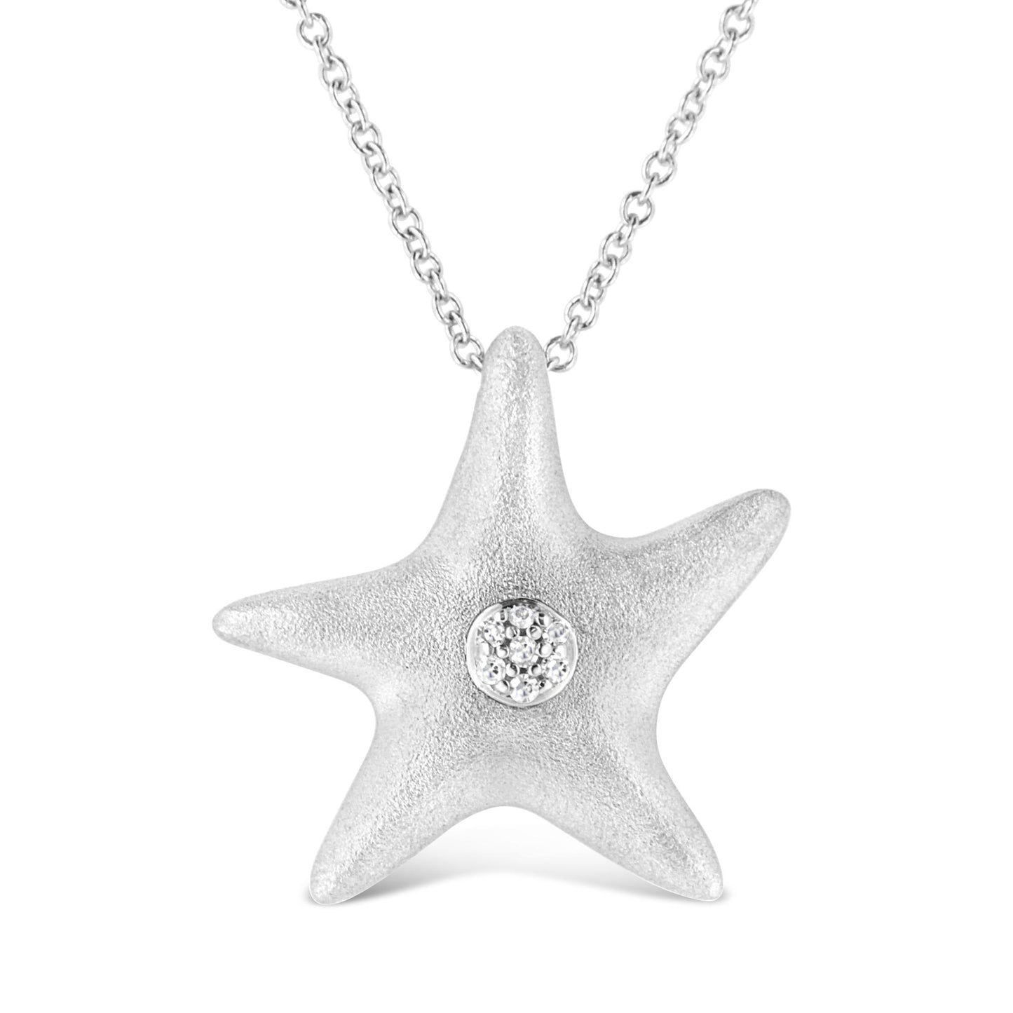 Front view of a white star-shaped necklace pendant with a cluster of round white gemstones in the center, hanging from a white chain.