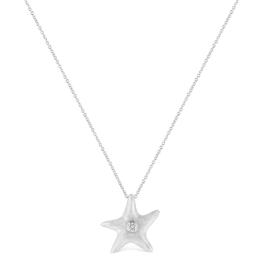 White metal necklace with a star-shaped pendant featuring a round white gemstone set in the center, shown from the front.