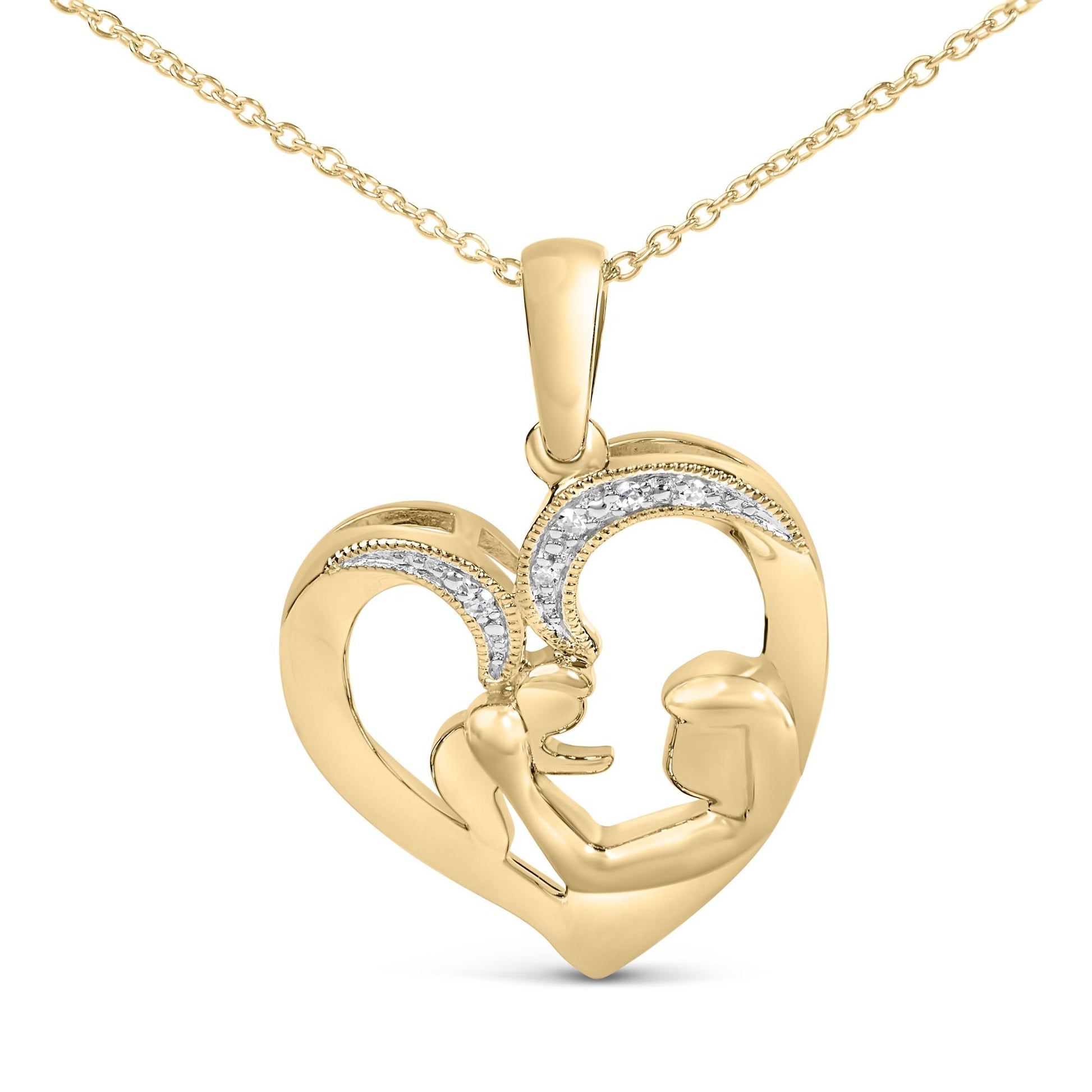 Close-up front angle of a yellow metal heart-shaped necklace pendant featuring an abstract design of two figures facing each other, accented with a curved row of small white gemstones in a pave setting.