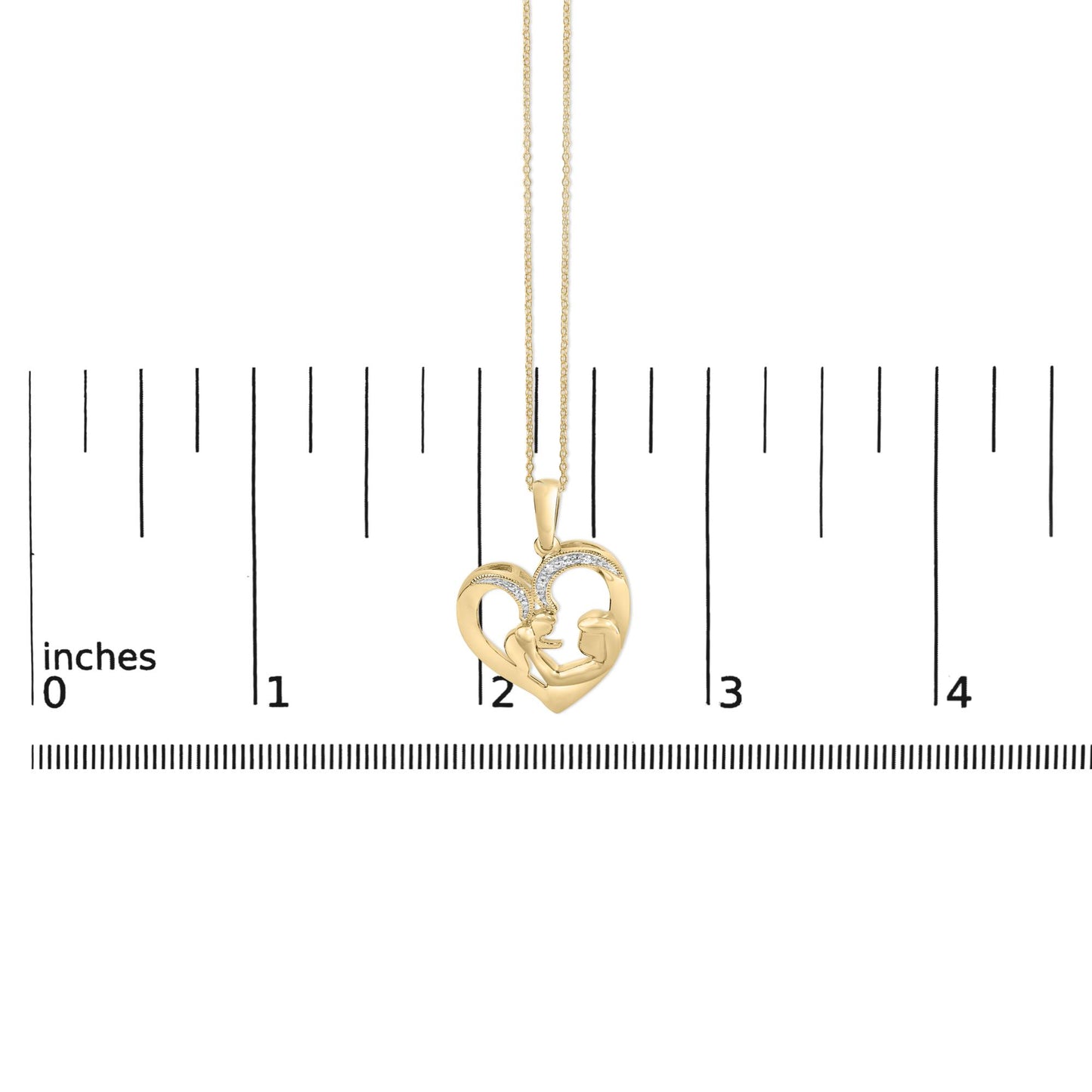 Close-up front view of a yellow necklace pendant in the shape of a heart featuring two figures inside and accented with five white round gemstones in a pave setting, shown hanging on a chain against a ruler scale.