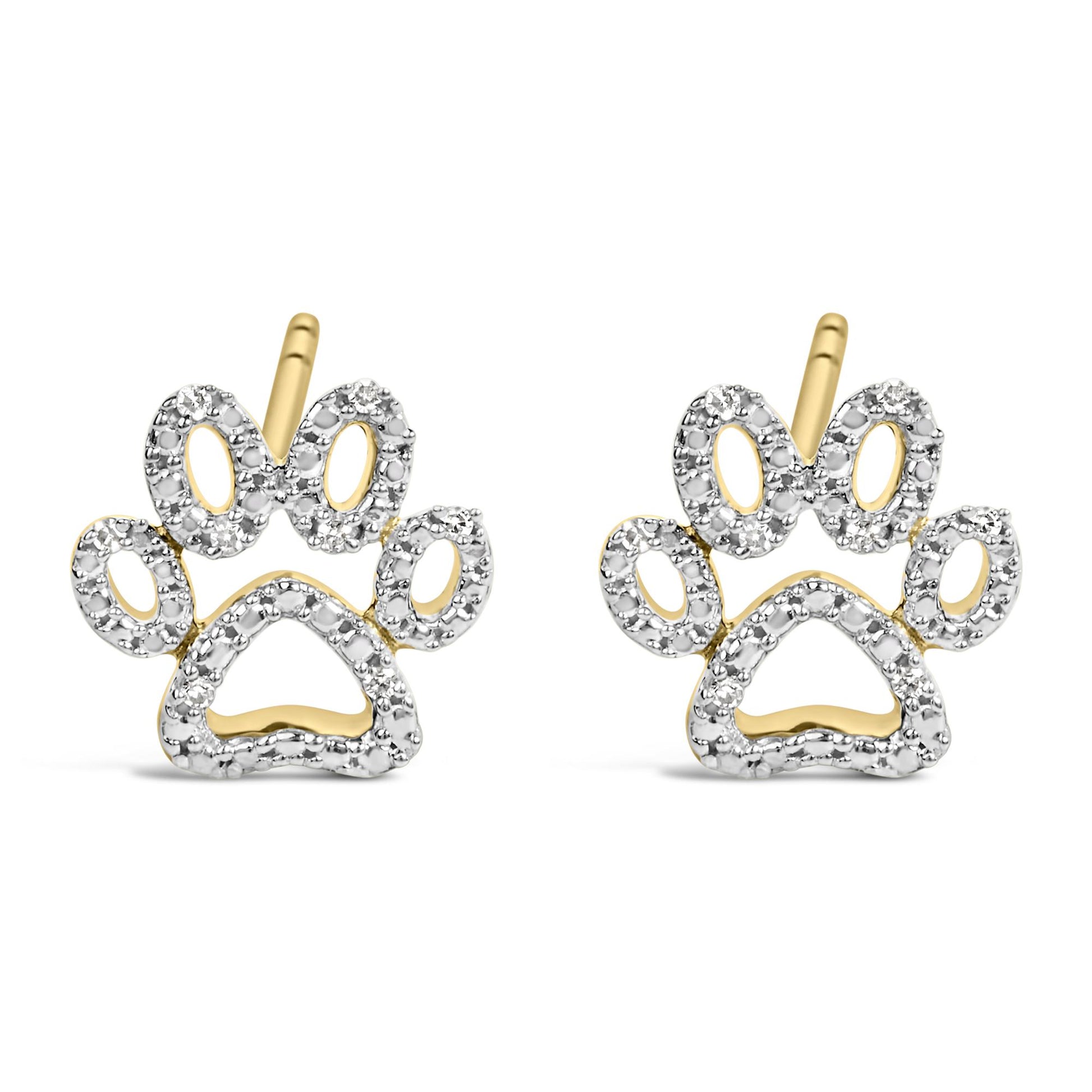 Close-up front view of a pair of yellow metal earrings shaped like stylized floral bows, adorned with multiple small white gemstones in prong settings.